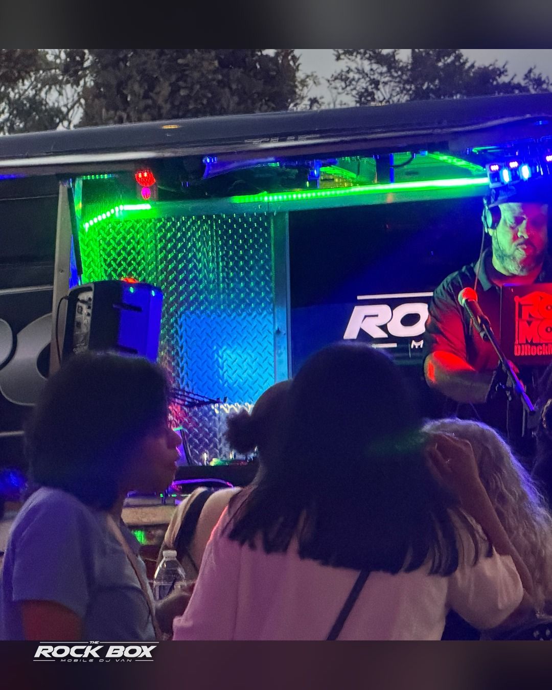 The Rock Box mobile DJ van at an event