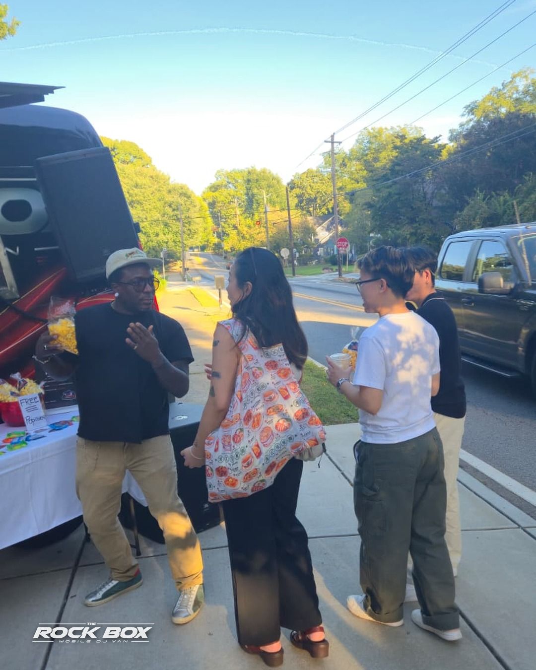 The Rock Box mobile DJ van at an event
