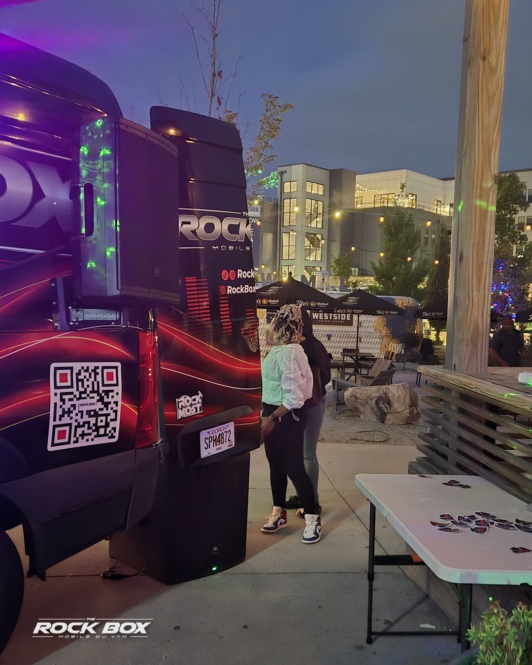 The Rock Box mobile DJ van at an event