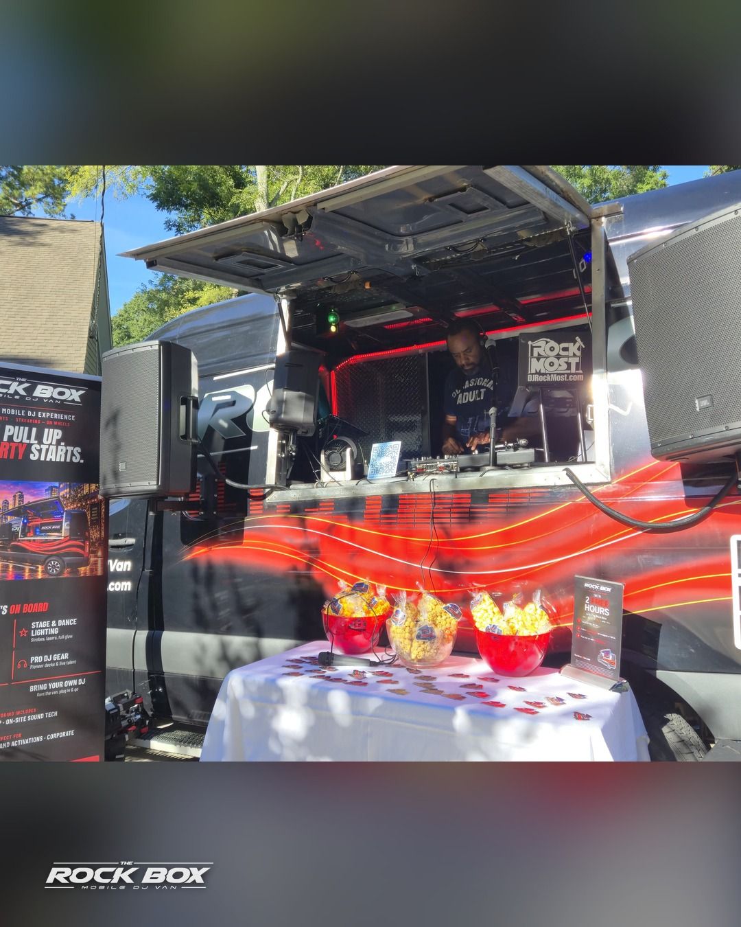 The Rock Box mobile DJ van at an event