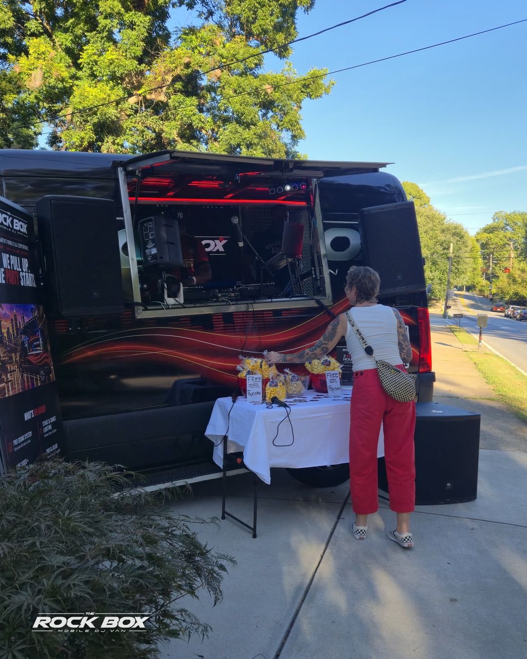 The Rock Box mobile DJ van at an event