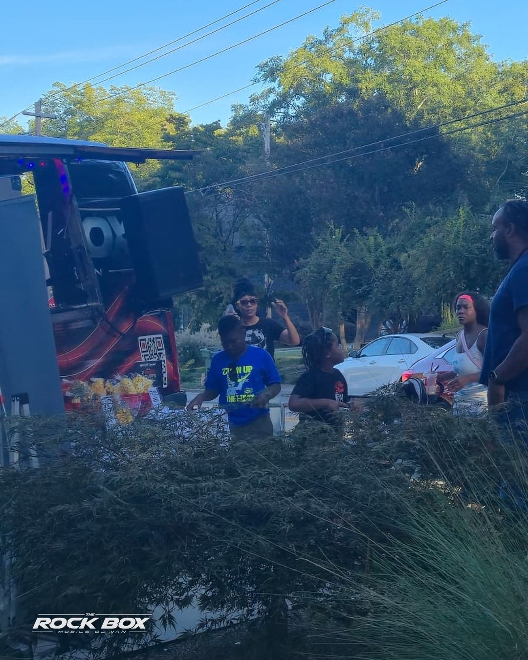 The Rock Box mobile DJ van at an event