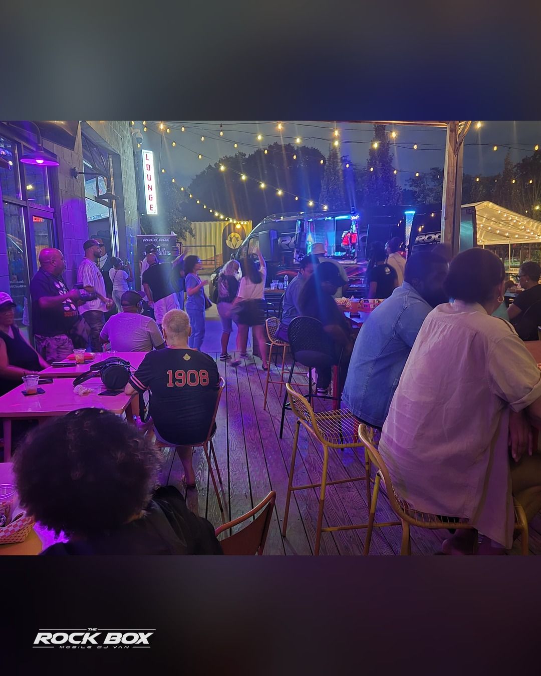 The Rock Box mobile DJ van at an event